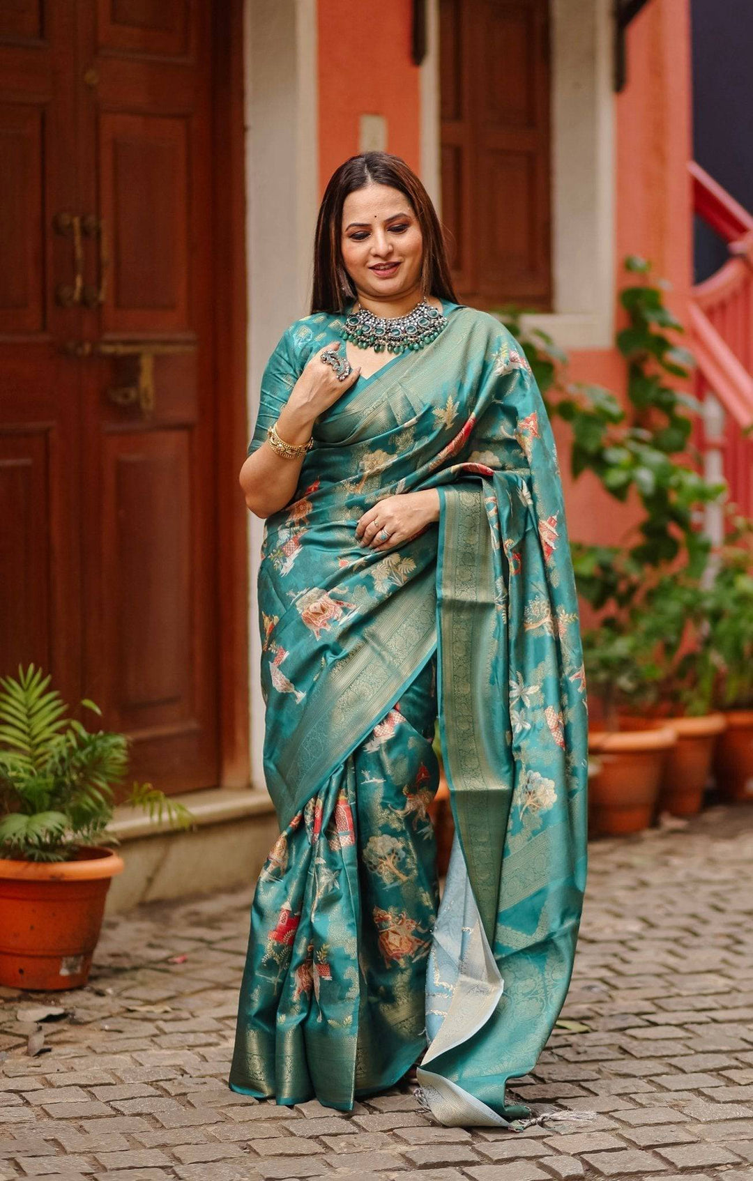 Teal Banarasi Silk Saree with Zari Weave Border & Intricate Traditional Motifs