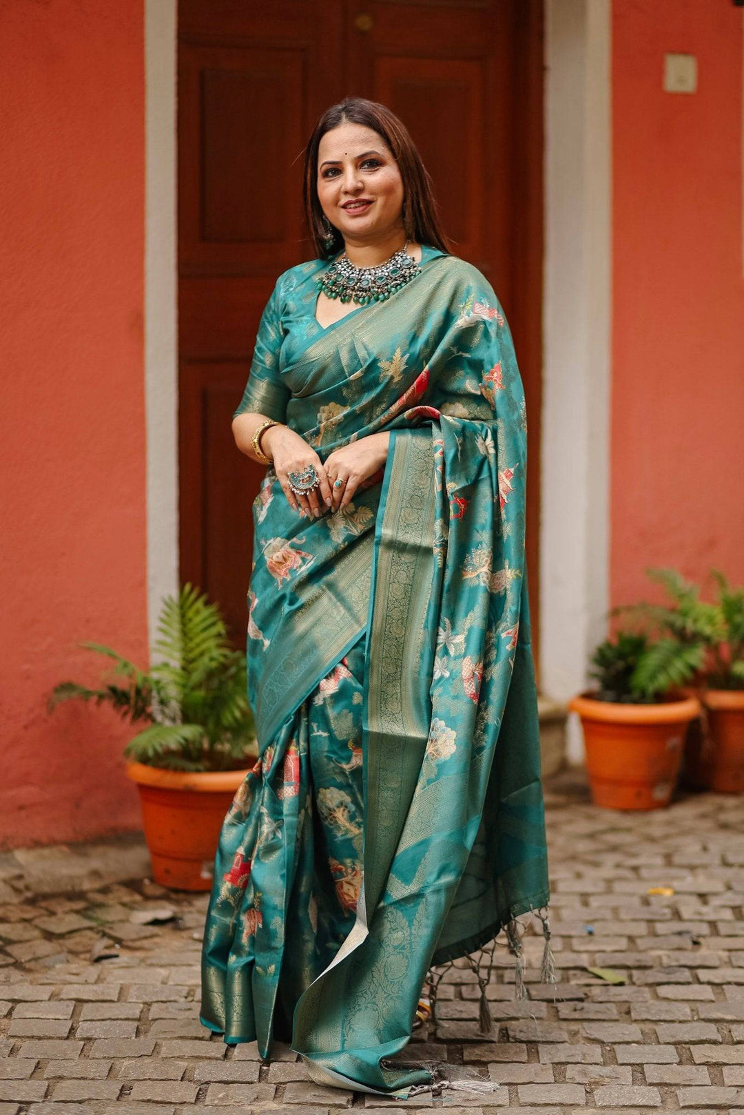 Teal Banarasi Silk Saree with Zari Weave Border & Intricate Traditional Motifs