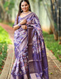 Regal Purple Banarasi Silk Saree with Floral Motifs and Elegant Tassels