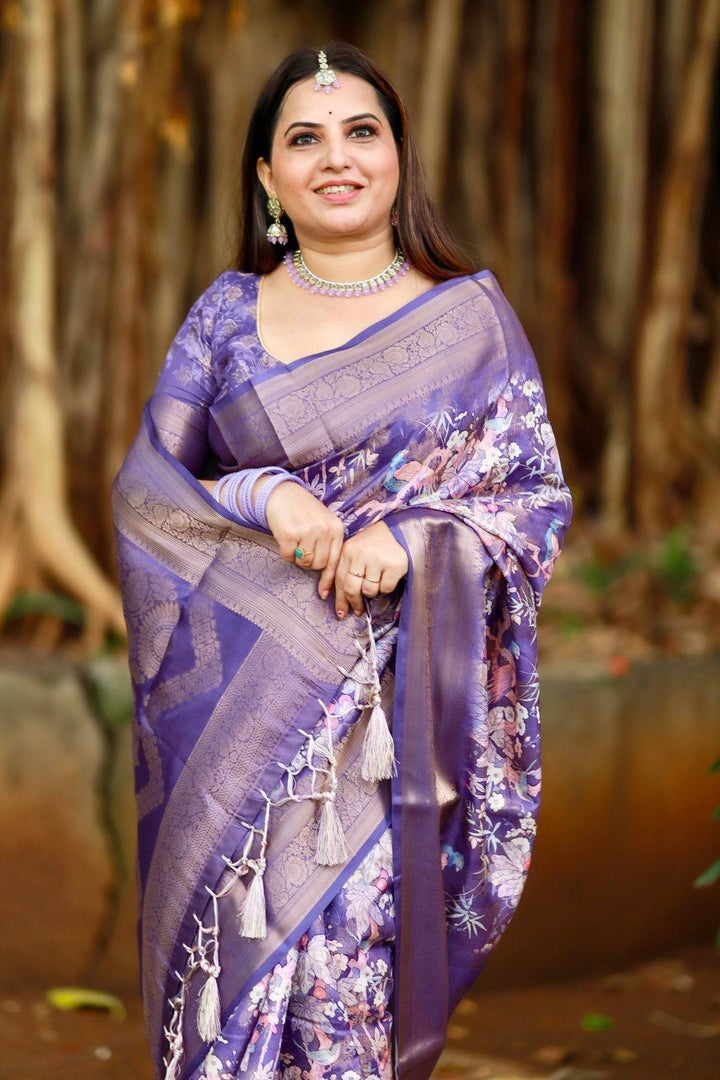 Regal Purple Banarasi Silk Saree with Floral Motifs and Elegant Tassels