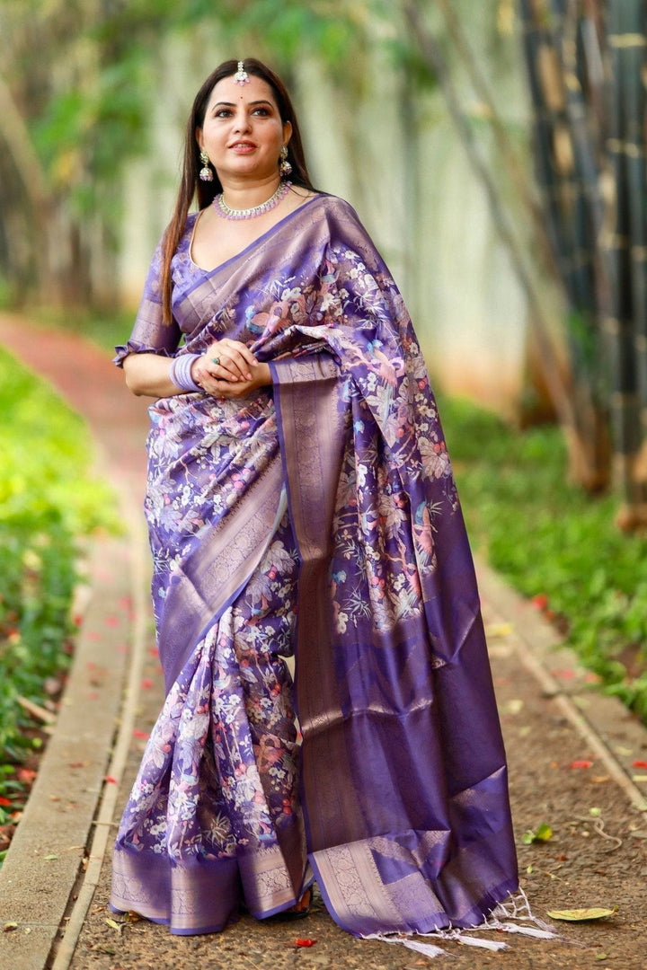 Regal Purple Banarasi Silk Saree with Floral Motifs and Elegant Tassels