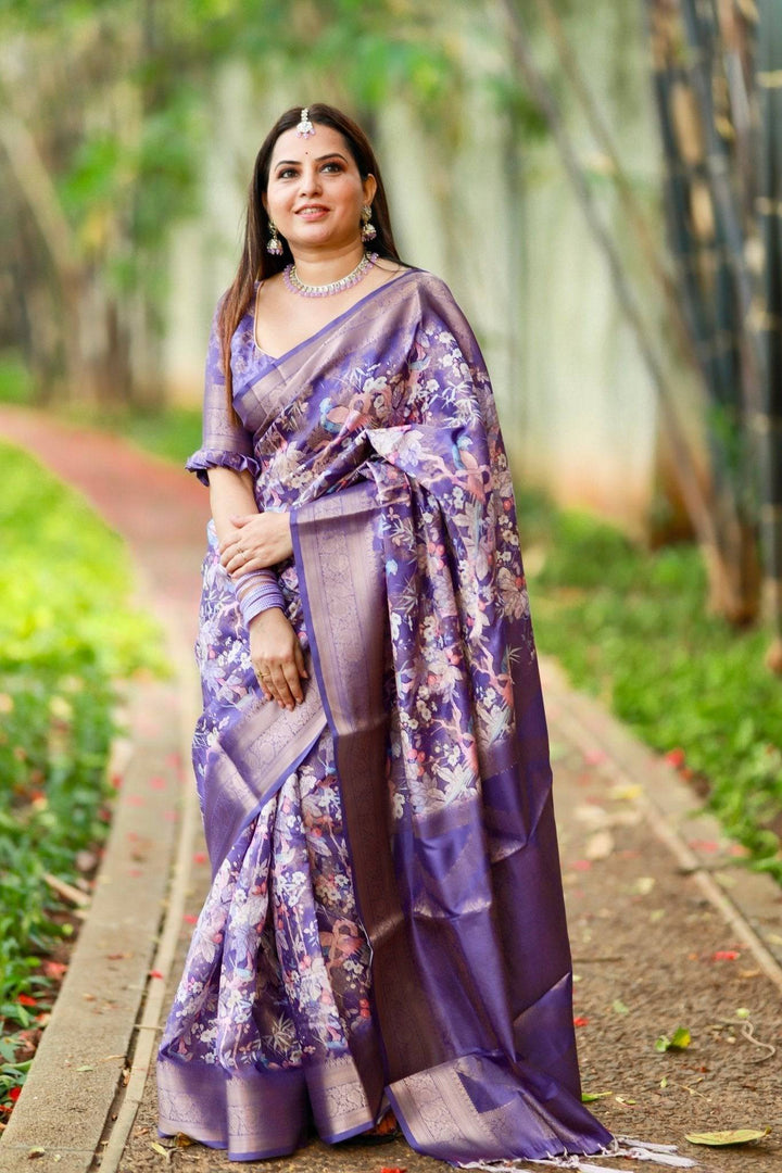 Regal Purple Banarasi Silk Saree with Floral Motifs and Elegant Tassels