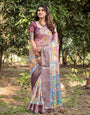 Pastel Beige Tussar Silk Saree with Vibrant Floral Motifs and Zari Border