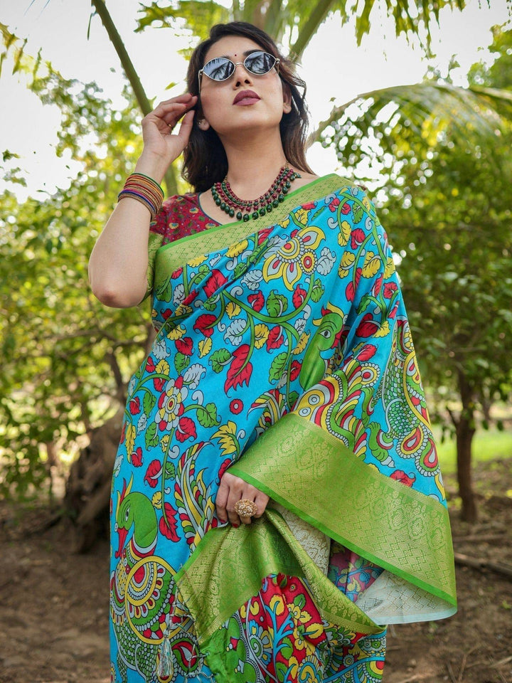 Vibrant Peacock Motif Blue and Green Tussar Silk Saree with Zari Border