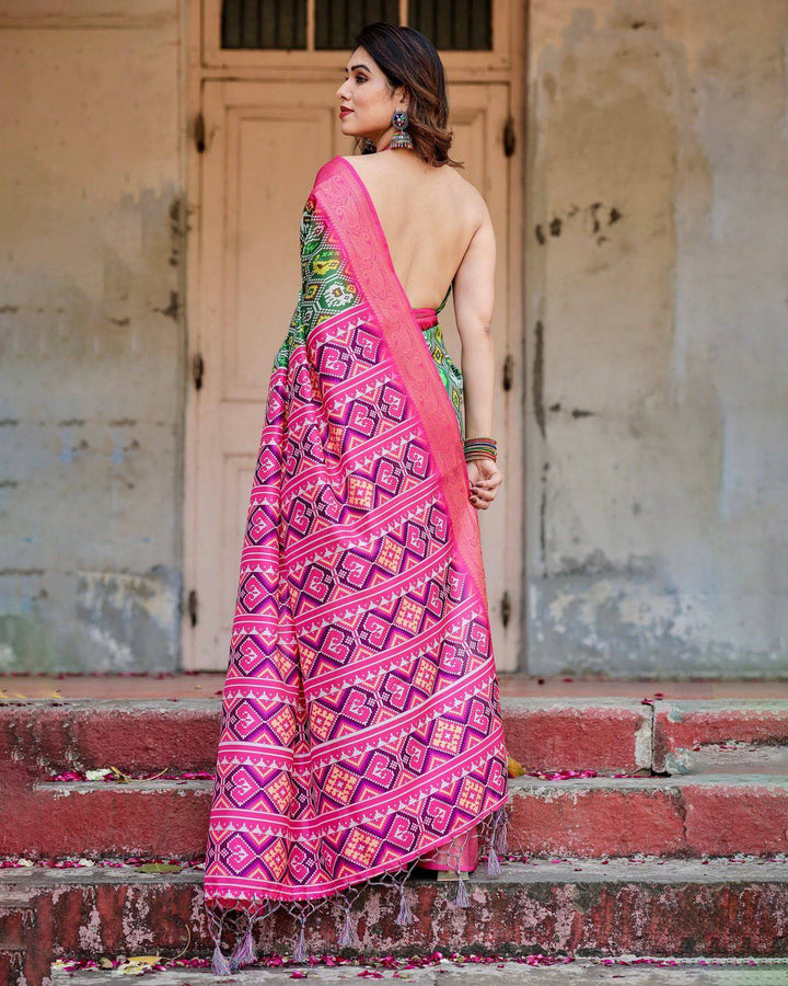 Green and Pink Tussar Silk Saree with Vibrant Ikat Patterns and Zari Border