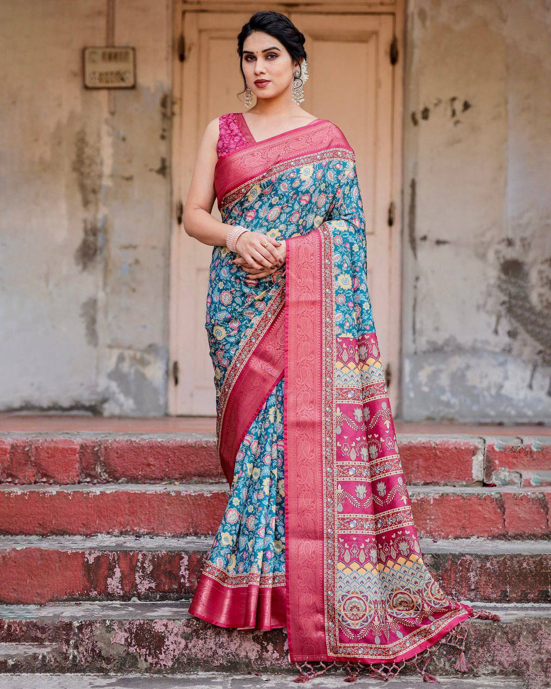 Teal Blue and Coral Tussar Silk Saree with Vibrant Floral Motifs and Ornamental Pallu