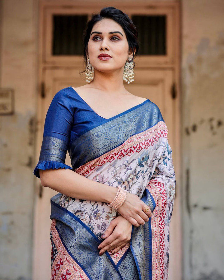 Ivory and Navy Blue Tussar Silk Saree with Floral Elegance and Ornamental Zari Work