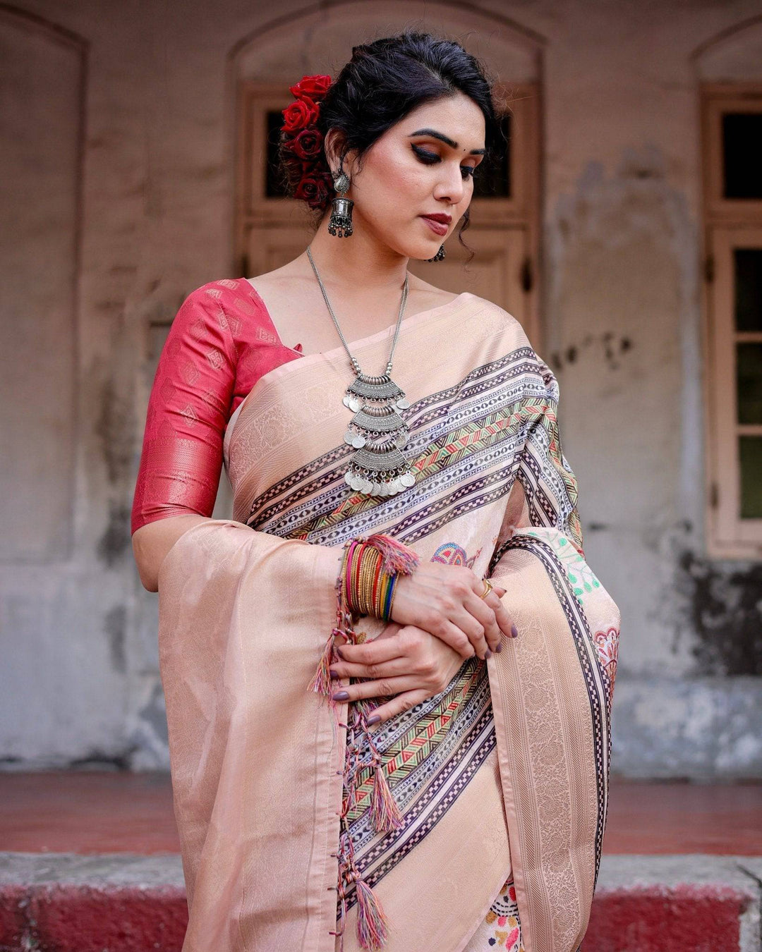 Elegant Peach Banarasi Silk Saree with Multicolor Embroidery and Tassels