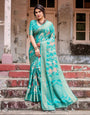 Elegant Teal Green Banarasi Silk Saree with Intricate Zari Weaving and Tassels