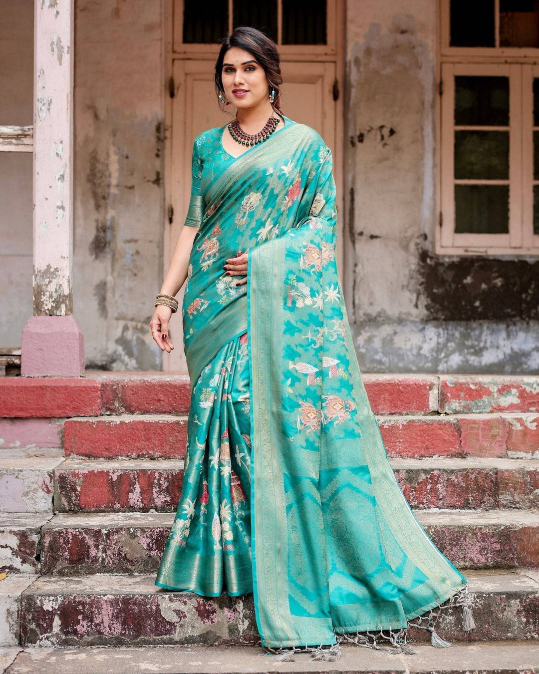 Elegant Teal Green Banarasi Silk Saree with Intricate Zari Weaving and Tassels