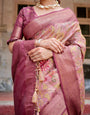 Elegant Pink Banarasi Silk Saree with Floral Zari Weaving and Tassel-Embellished Pallu