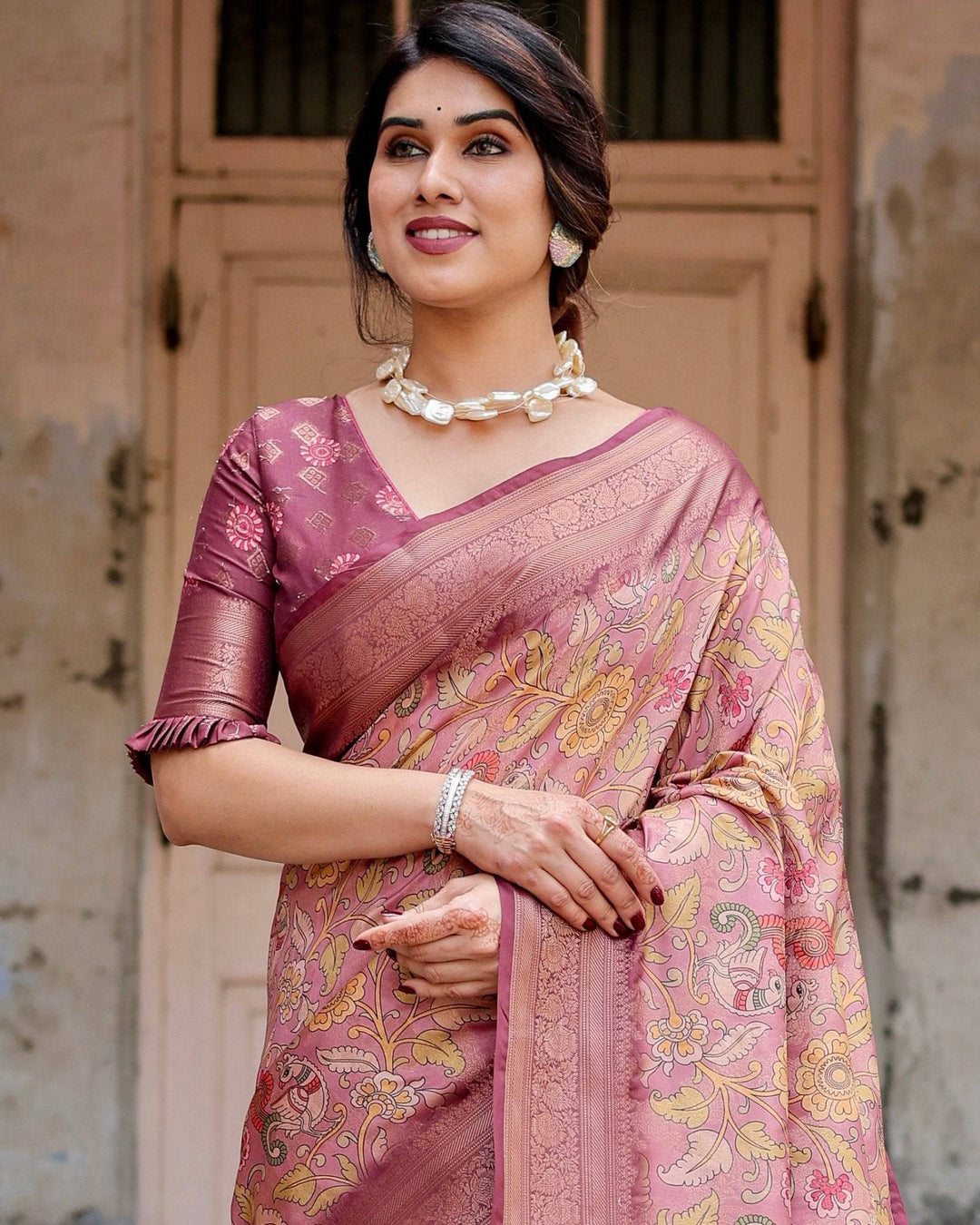 Elegant Pink Banarasi Silk Saree with Floral Zari Weaving and Tassel-Embellished Pallu