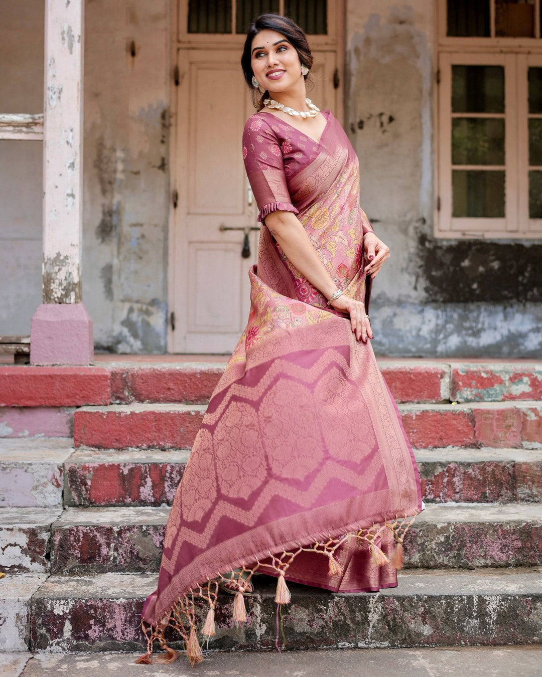 Elegant Pink Banarasi Silk Saree with Floral Zari Weaving and Tassel-Embellished Pallu