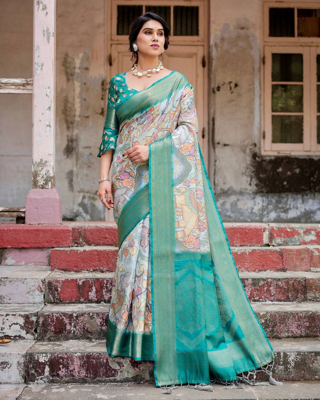 Graceful Green Banarasi Silk Saree with Vibrant Motifs and Zari Woven Pallu