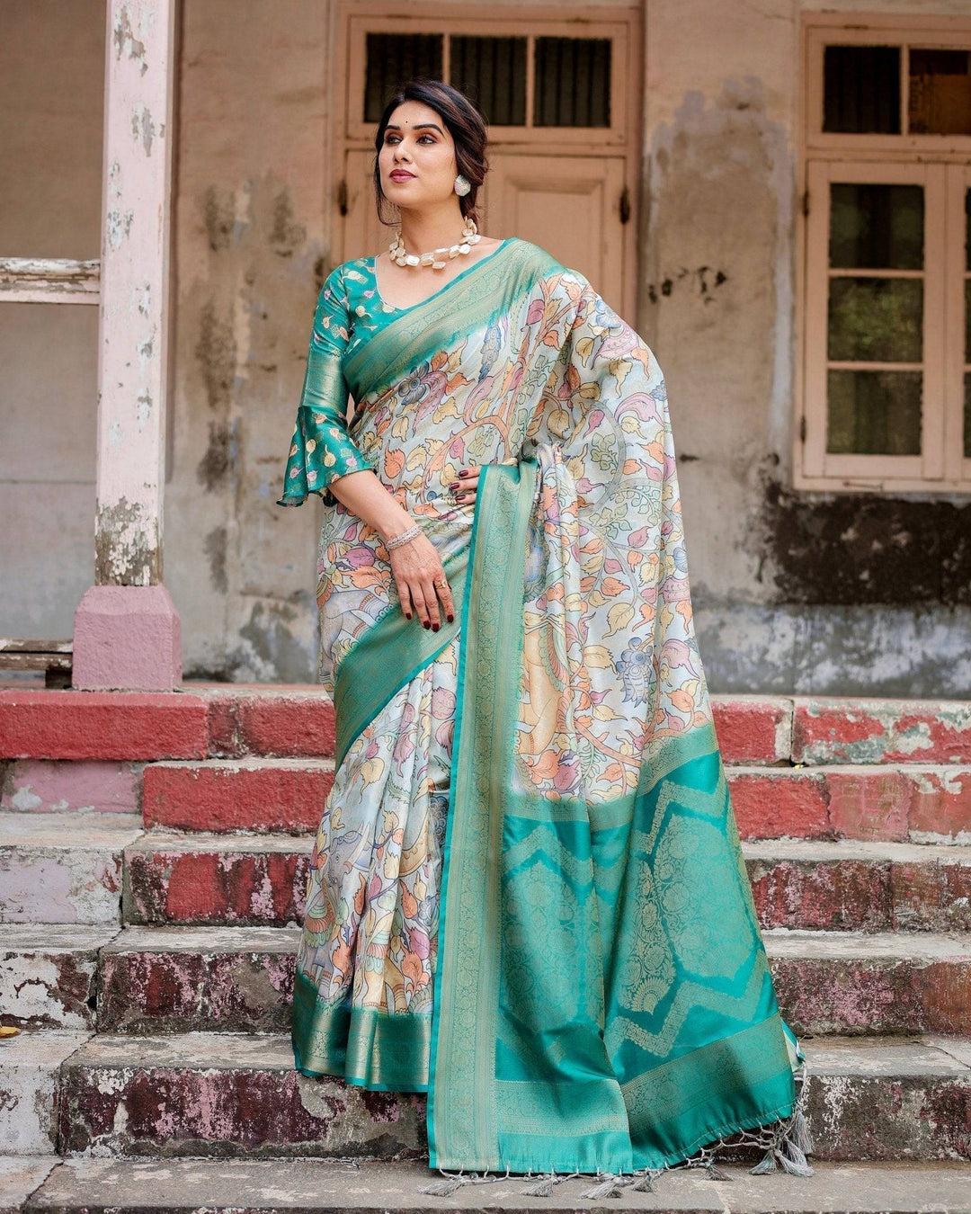 Graceful Green Banarasi Silk Saree with Vibrant Motifs and Zari Woven Pallu