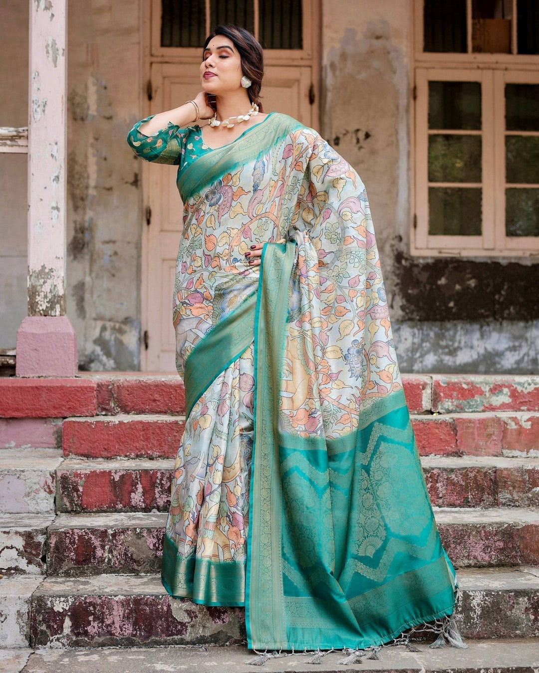 Graceful Green Banarasi Silk Saree with Vibrant Motifs and Zari Woven Pallu