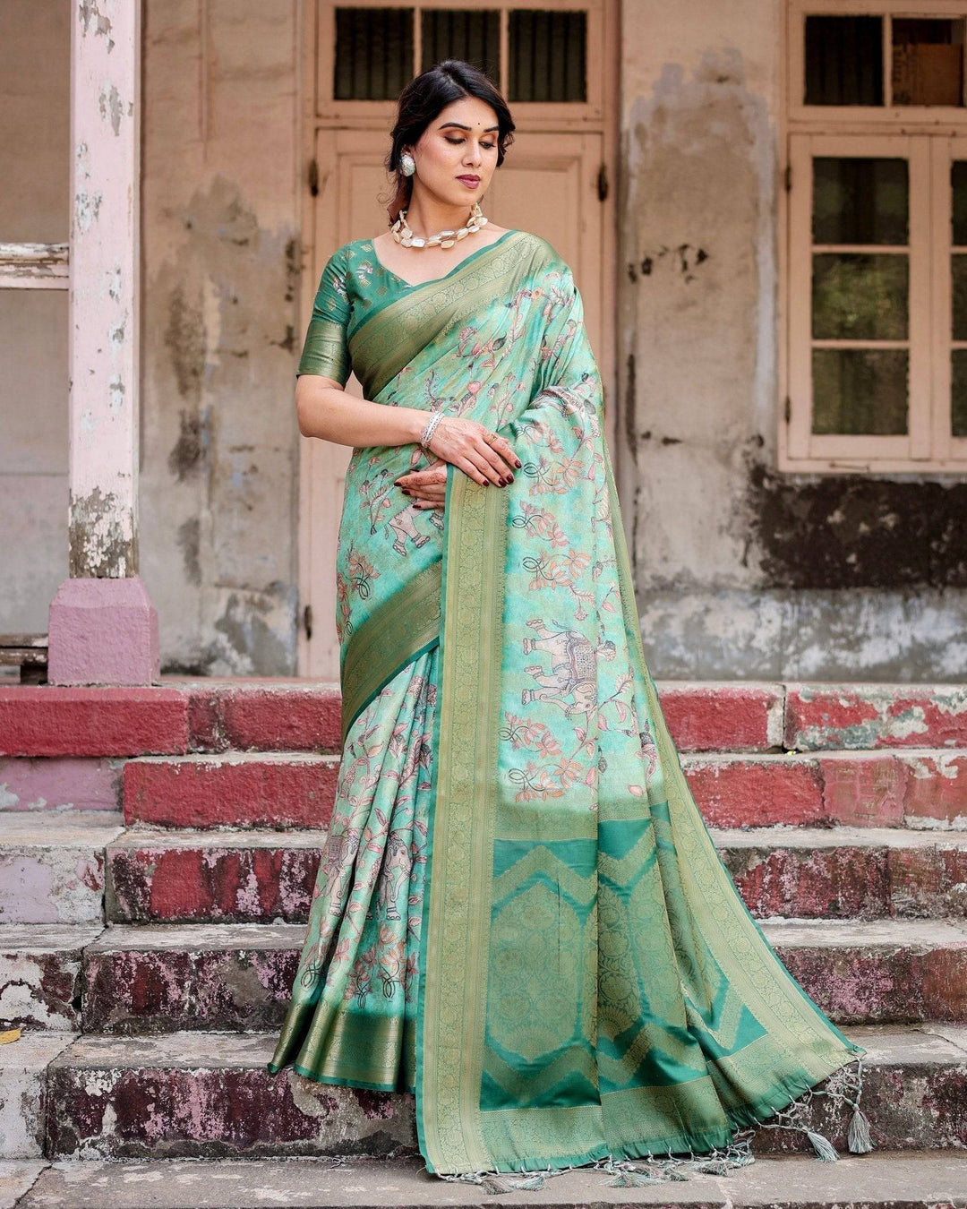 Graceful Green Banarasi Silk Saree with Intricate Floral and Elephant Weaves