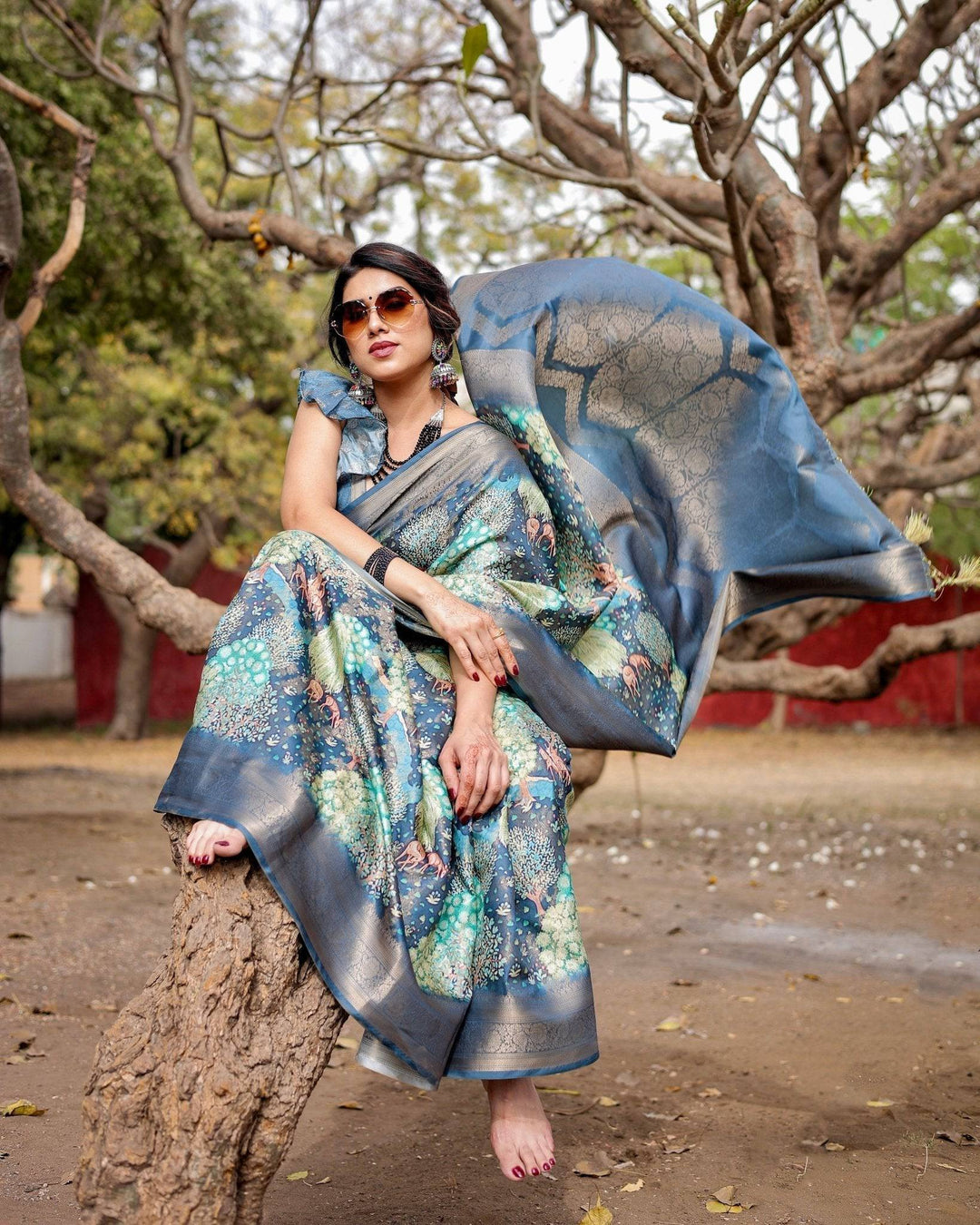 Graceful Navy Blue Banarasi Silk Saree with Nature-Inspired Digital Prints and Elegant Zari Woven Border