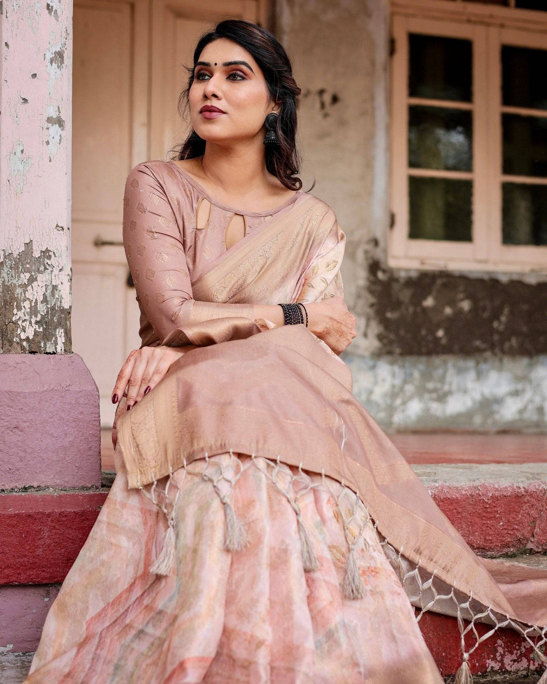 Elegant Beige Banarasi Silk Saree with Tassels and Zari Work