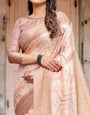 Elegant Beige Banarasi Silk Saree with Tassels and Zari Work