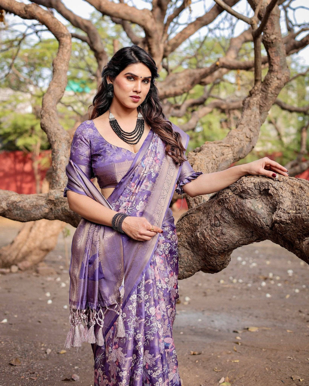 Elegant Purple Banarasi Silk Saree with Floral Weave, Zari Border, and Tassels