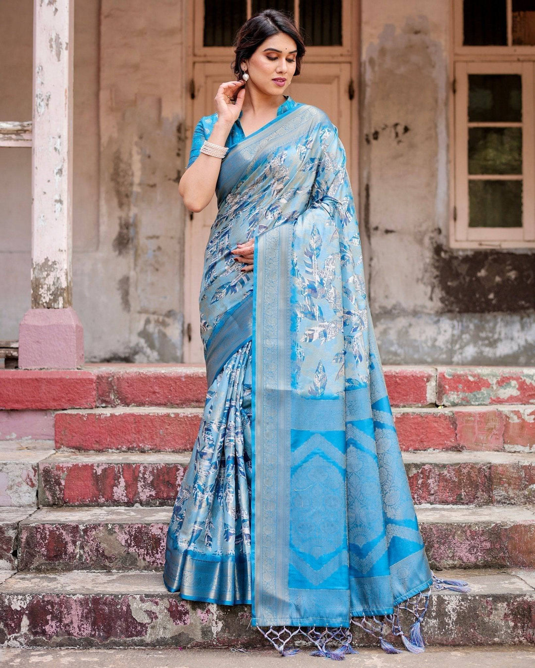 Aqua Blue Banarasi Silk Saree with Zari Border, Floral Motifs, and Tassels