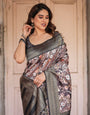 Elegant Black and Peach Banarasi Silk Saree with Zari Border and Tassels