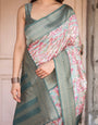 White Banarasi Silk Saree with Pastel Multicolor Prints and Green Zari Border