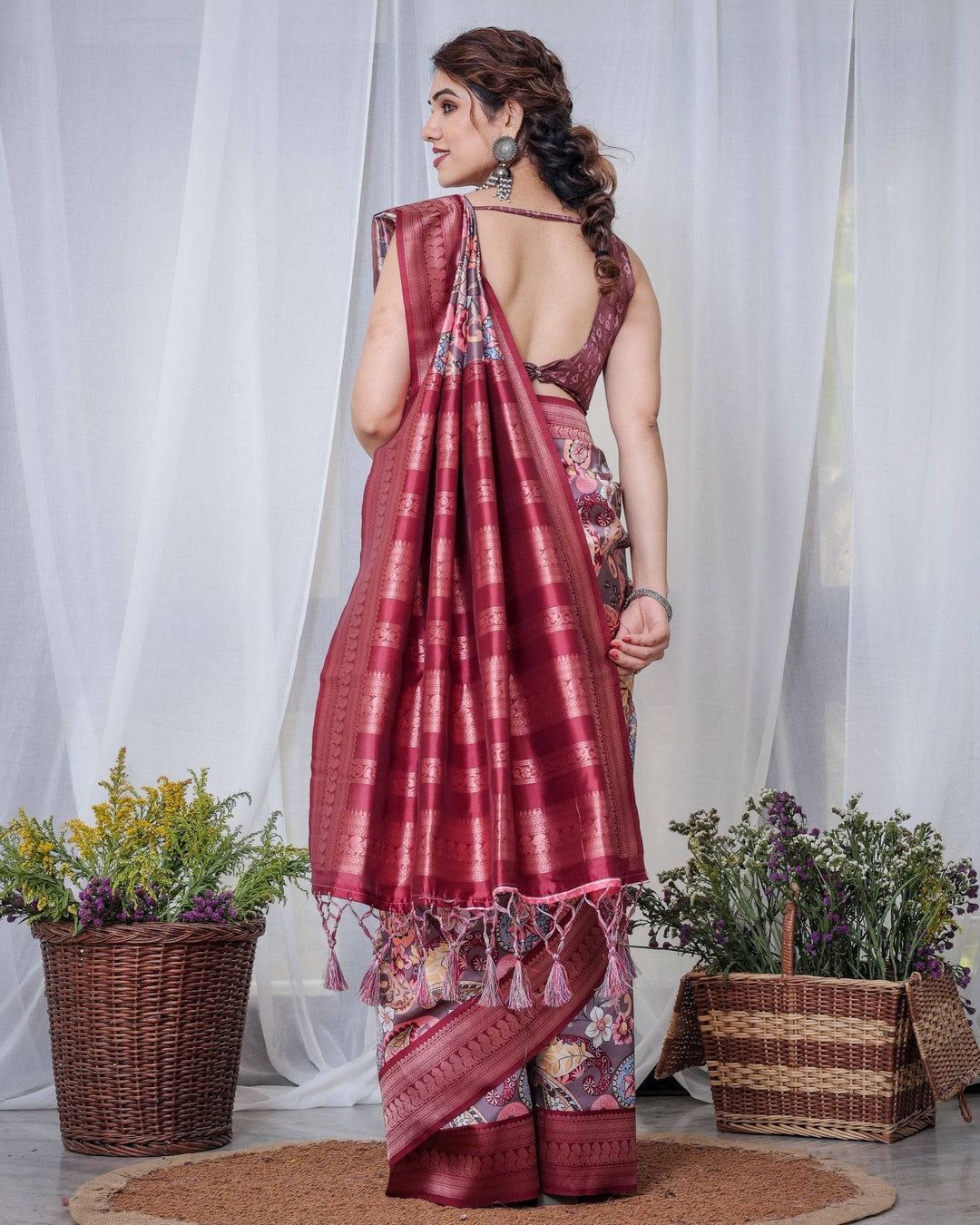 Luxurious Maroon Banarasi Silk Saree with Paisley Print and Tassels