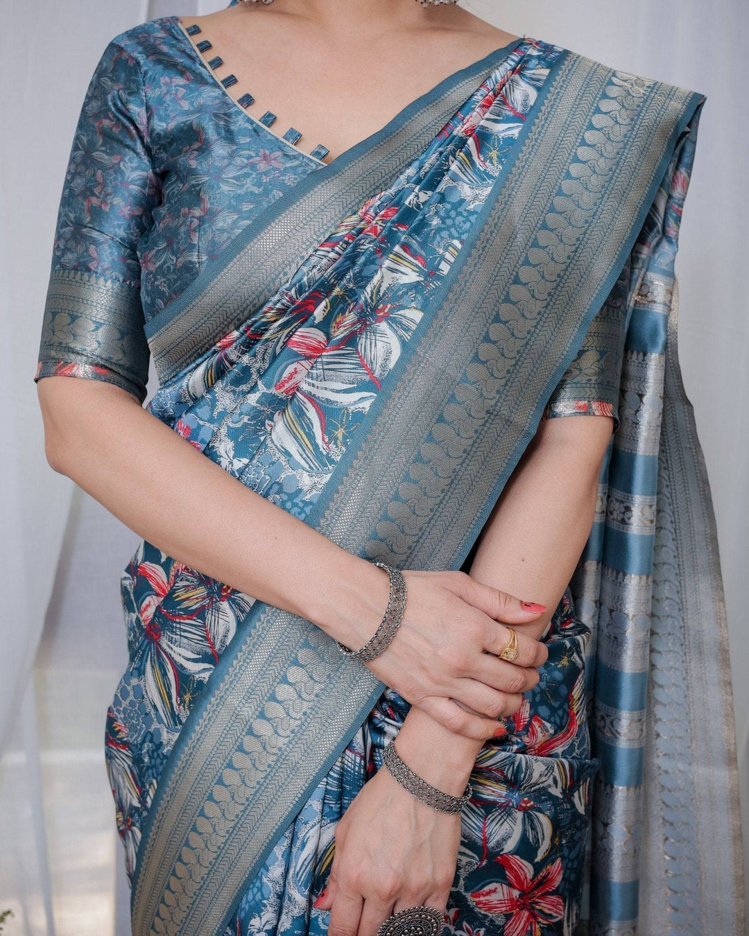 Enchanting Blue Banarasi Silk Saree with Multicolor Floral Weaves and Luxurious Zari Pallu with Tassels