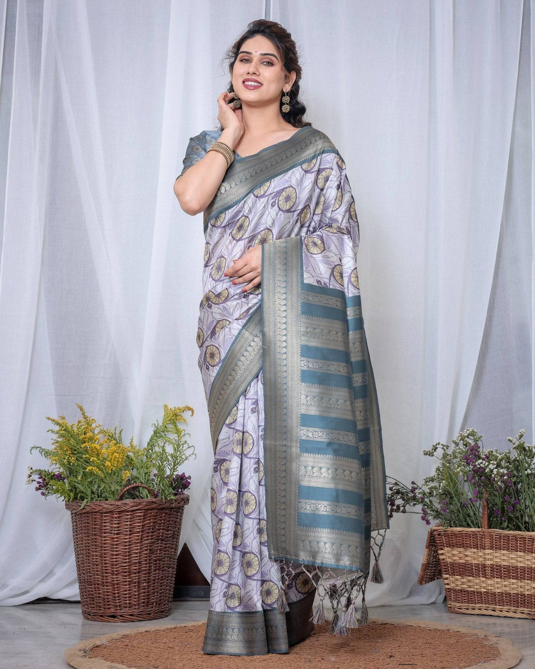 Graceful Banarasi Digitally Printed Silk Saree in Silver and Teal with Zari Work and Tassels