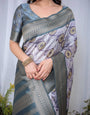 Graceful Banarasi Digitally Printed Silk Saree in Silver and Teal with Zari Work and Tassels