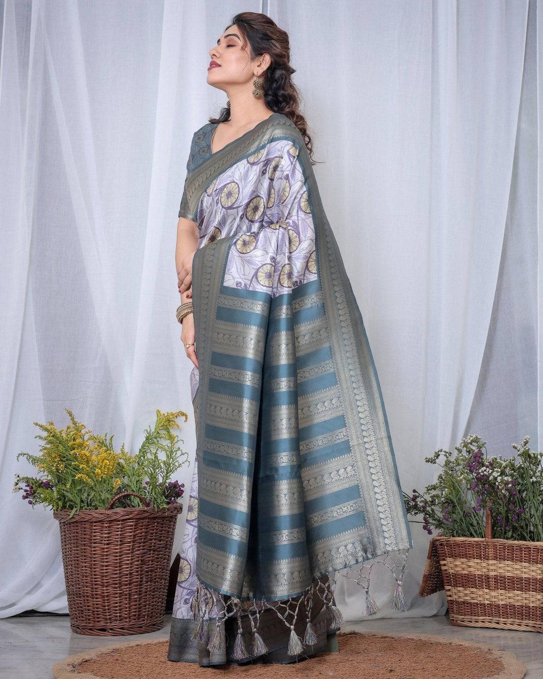 Graceful Banarasi Digitally Printed Silk Saree in Silver and Teal with Zari Work and Tassels