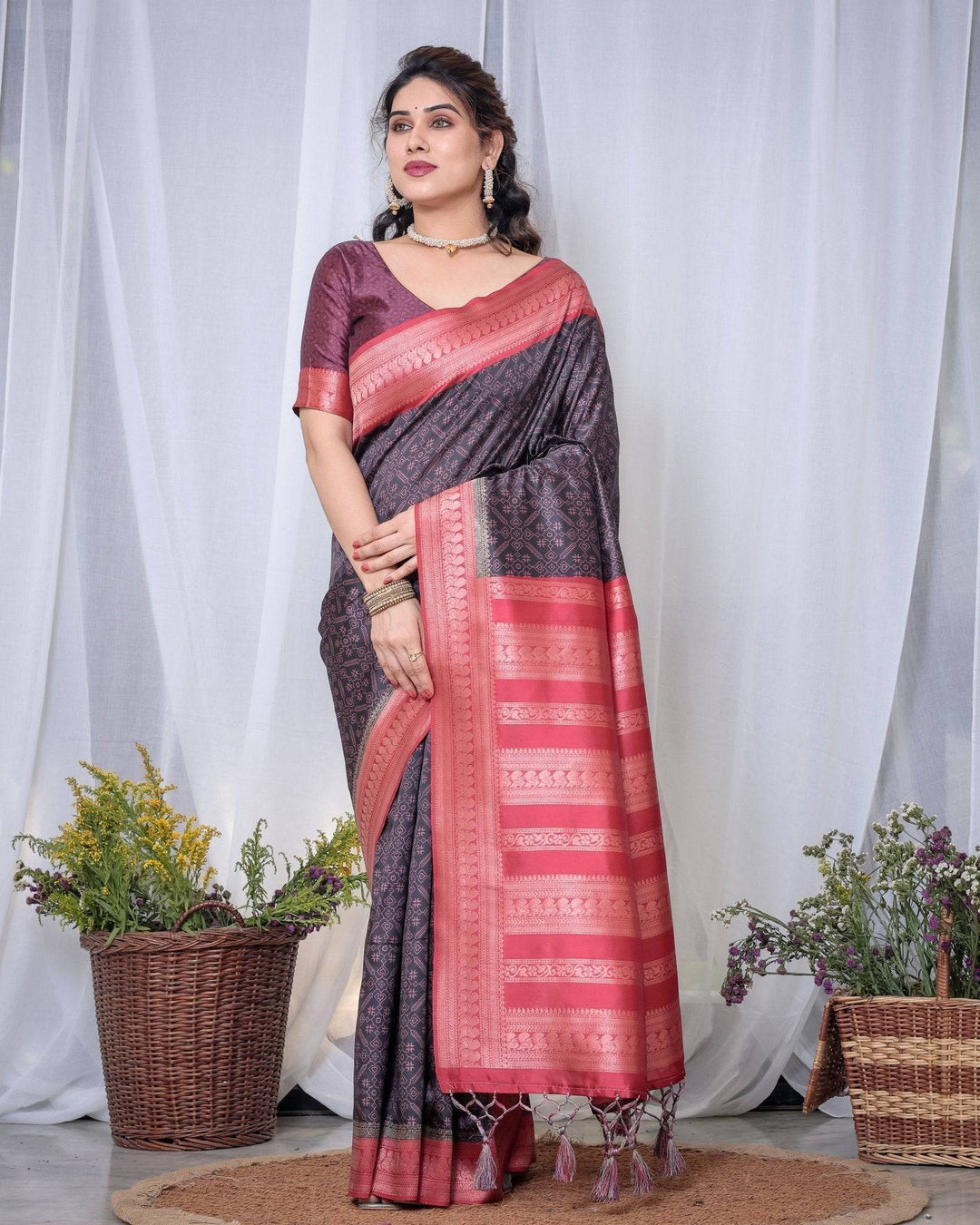 Majestic Black Banarasi Silk Saree with Rose Gold Border and Tassels