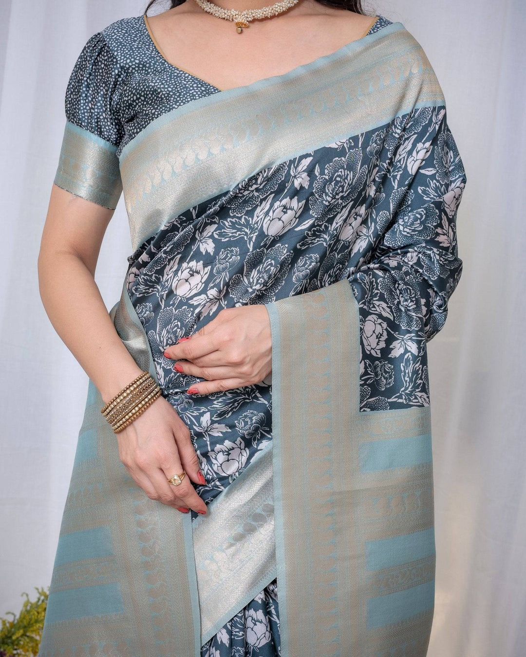 Timeless Blue and Silver Banarasi Silk Saree with Floral Design and Tassels