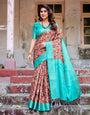 Maroon and Teal Paisley Design Banarasi Silk Saree with Zari Weave and Tassel-Embellished Pallu