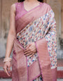 Beige and Pink Geometric Print Banarasi Silk Saree with Zari Weave and Tassel-Embellished Pallu