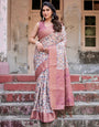 Beige and Pink Geometric Print Banarasi Silk Saree with Zari Weave and Tassel-Embellished Pallu