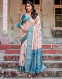 Peach and Teal Floral Digital Print Banarasi Silk Saree with Zari Weave and Tassel-Adorned Pallu