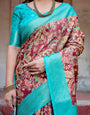 Maroon and Teal Paisley Design Banarasi Silk Saree with Zari Weave and Tassel-Embellished Pallu