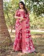 Maroon Tussar Silk Saree with White Floral Motifs, Intricate Zari Border, and Elegant Tassel Pallu