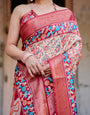 Beige and Coral Tussar Silk Saree with Intricate Floral Prints and Artistic Pallu